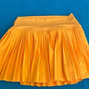 Bright orange tennis Skirt